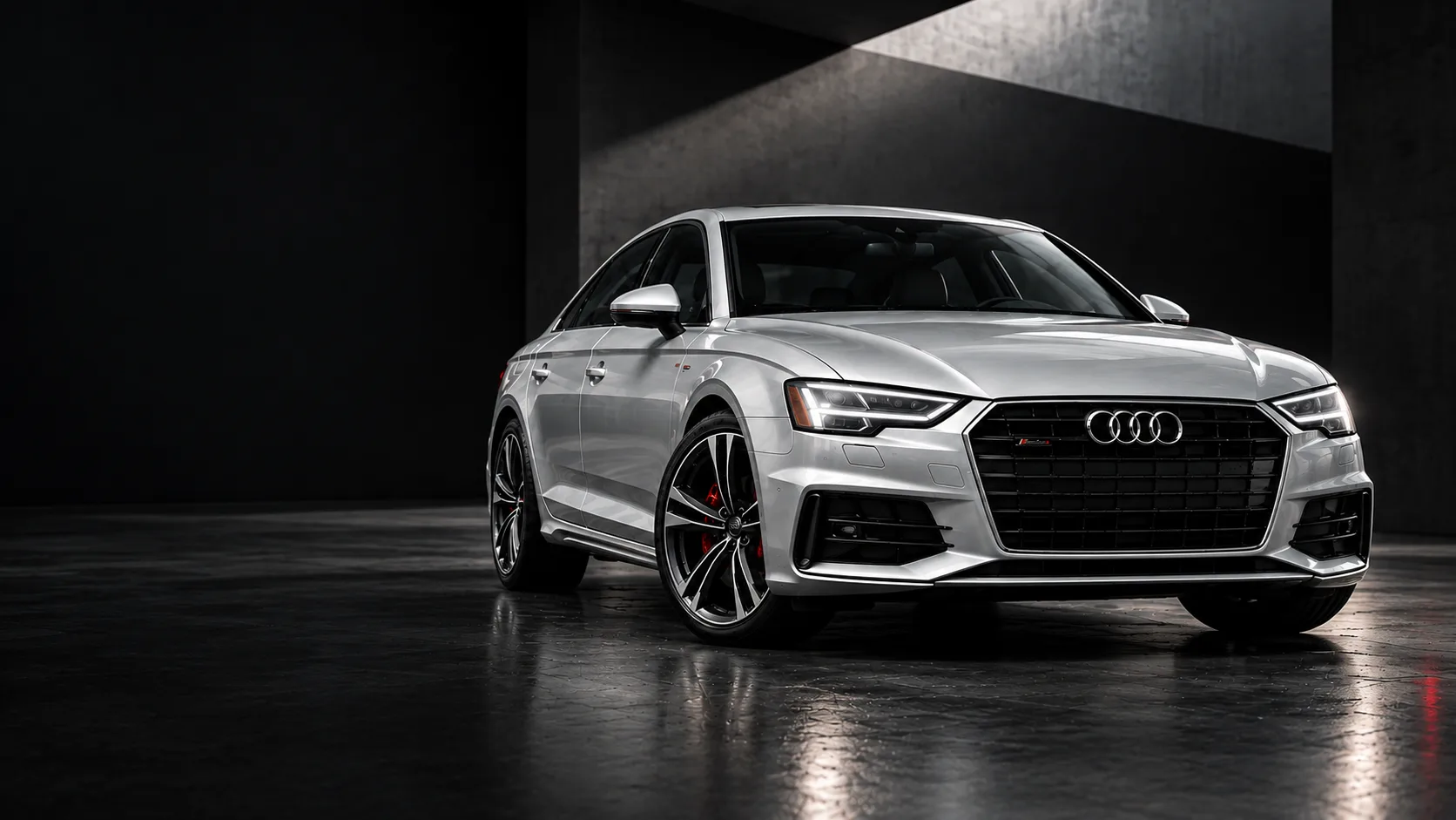 Silver European sportback in a dark architectural setting
